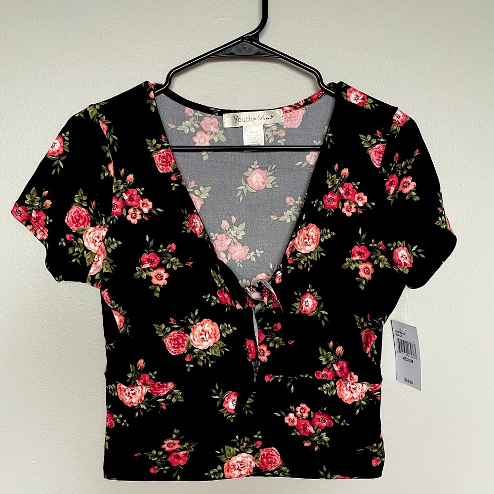 Black crop top with pink floral pattern